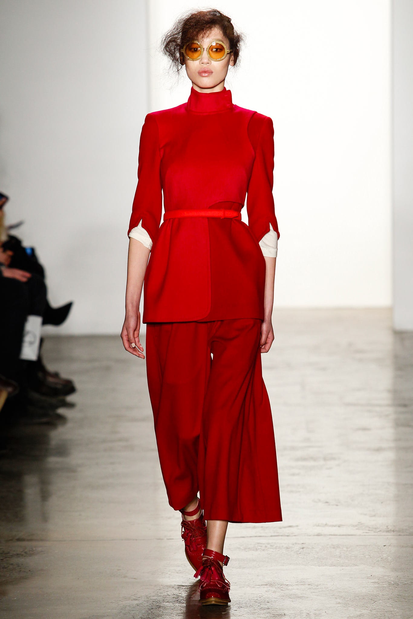 red long-sleeve high-neck fitted structured belted top