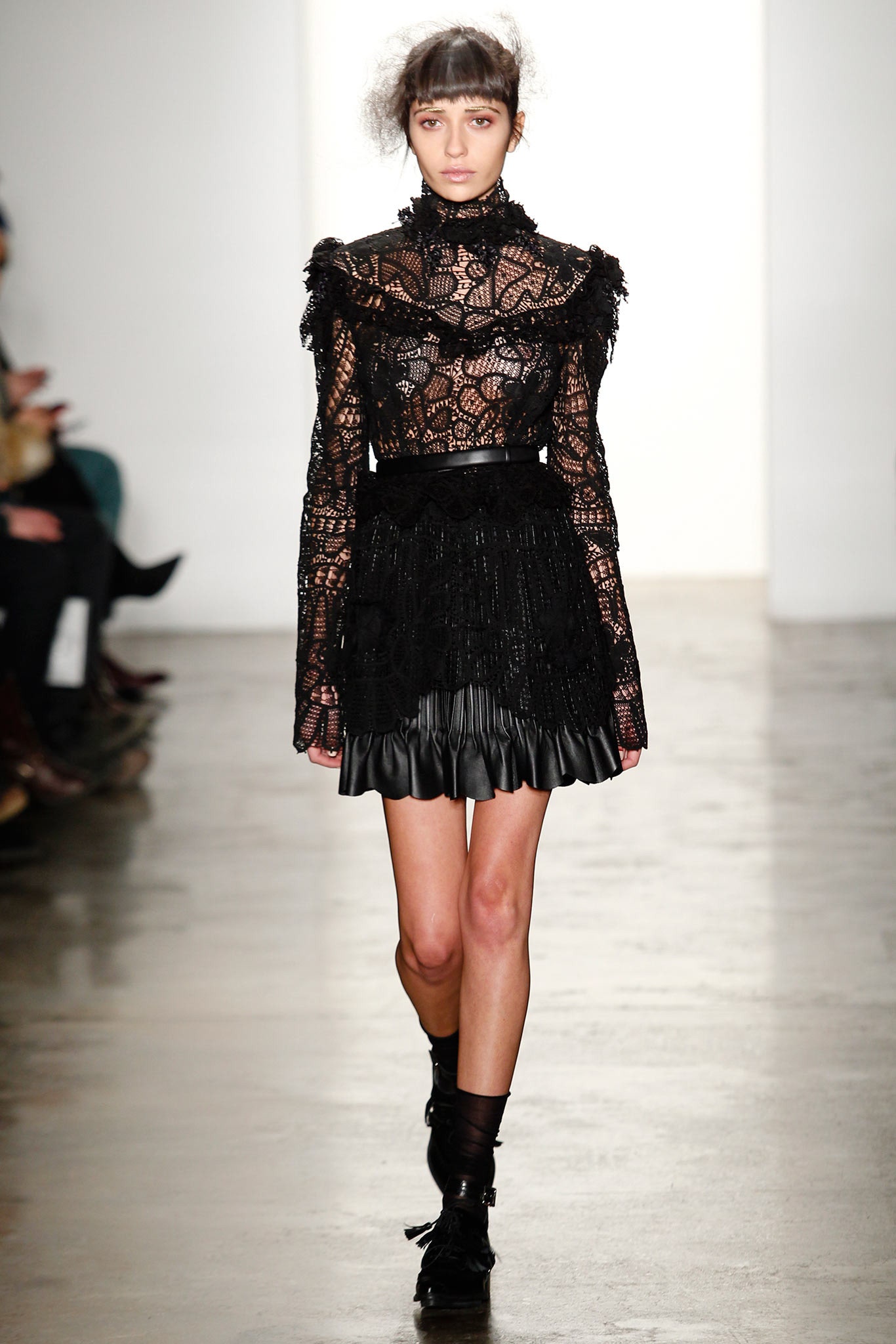 black lace blouse and leather skirt