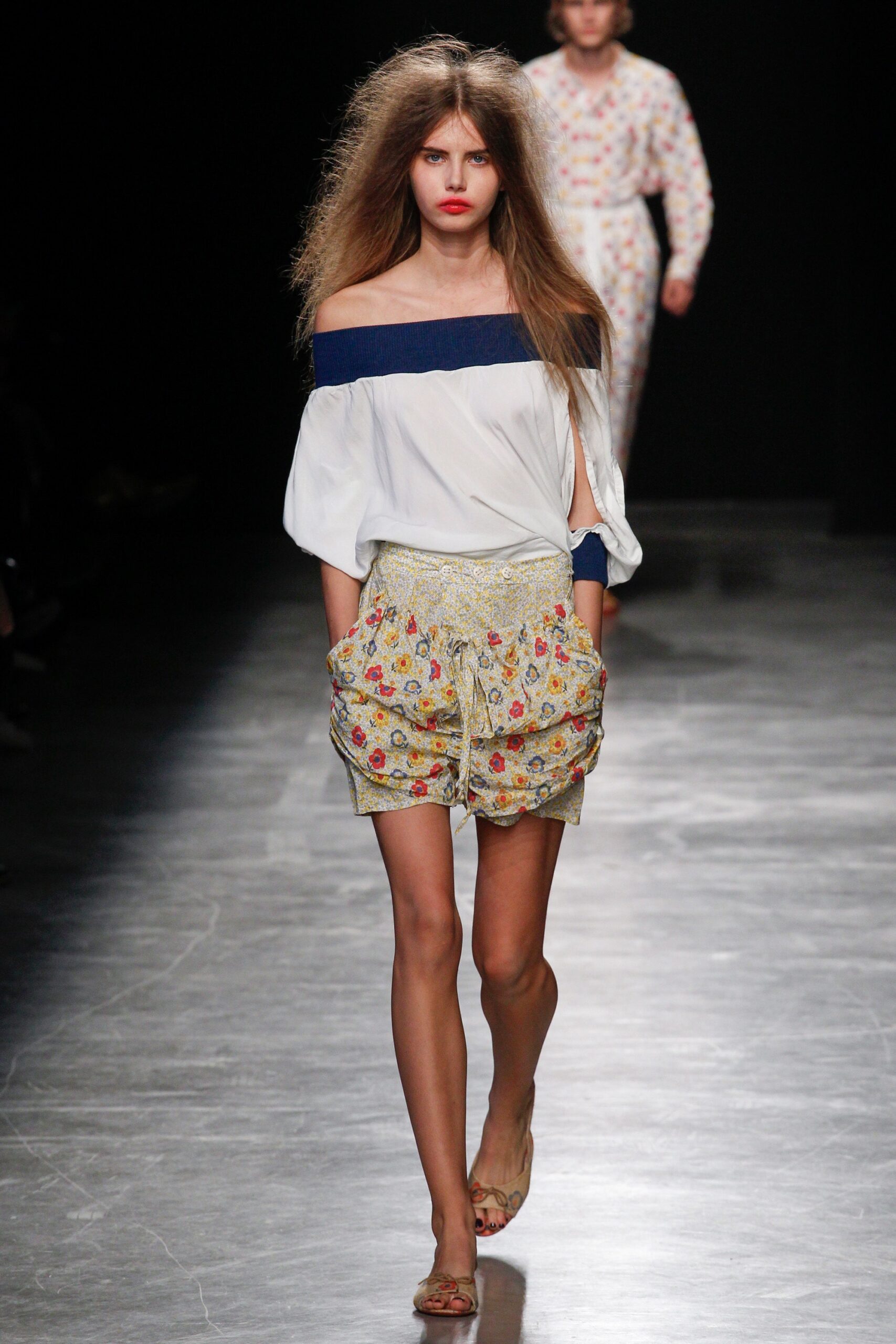 white off-shoulder blouse with embroidered shorts