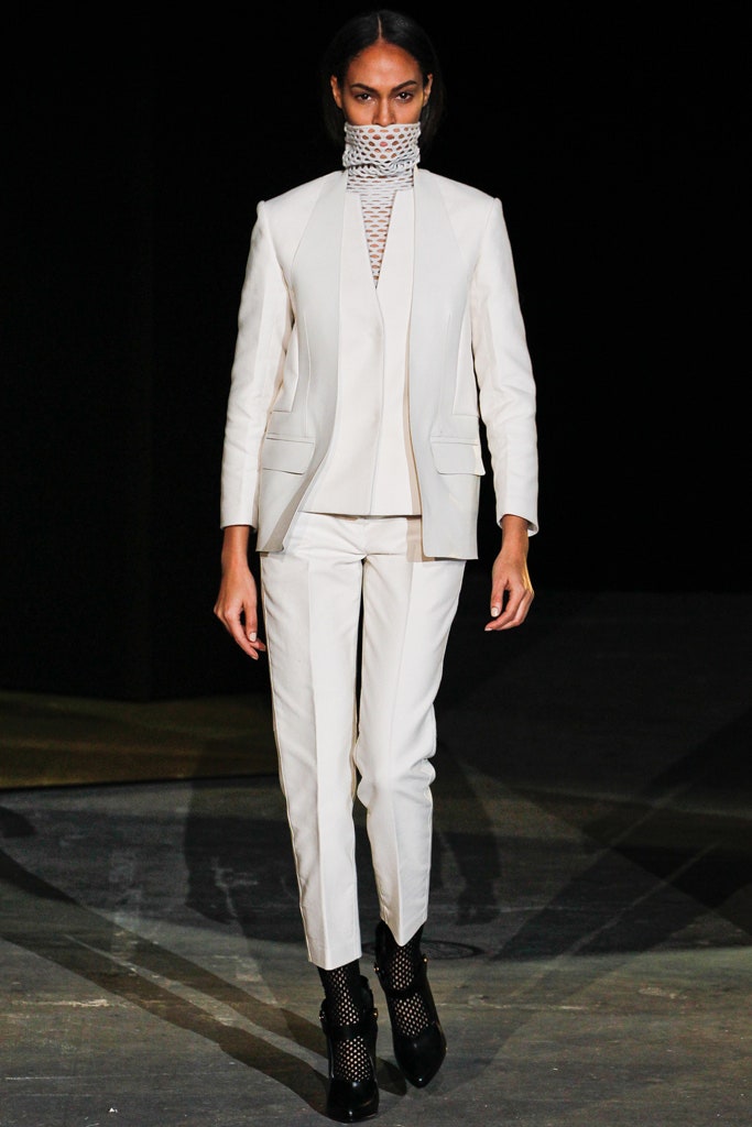 white tailored suit with black shoes