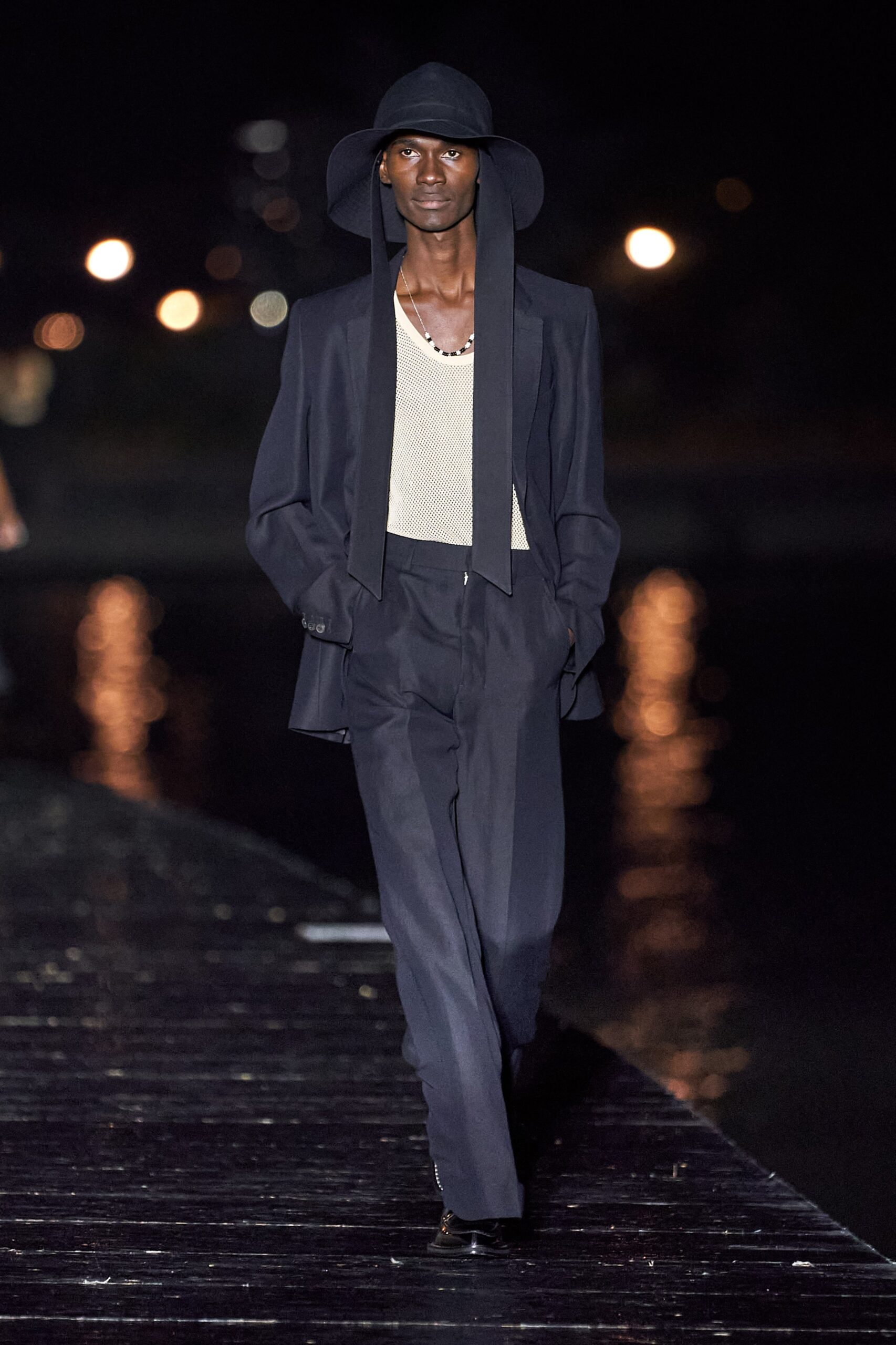 black tailored suit with white top