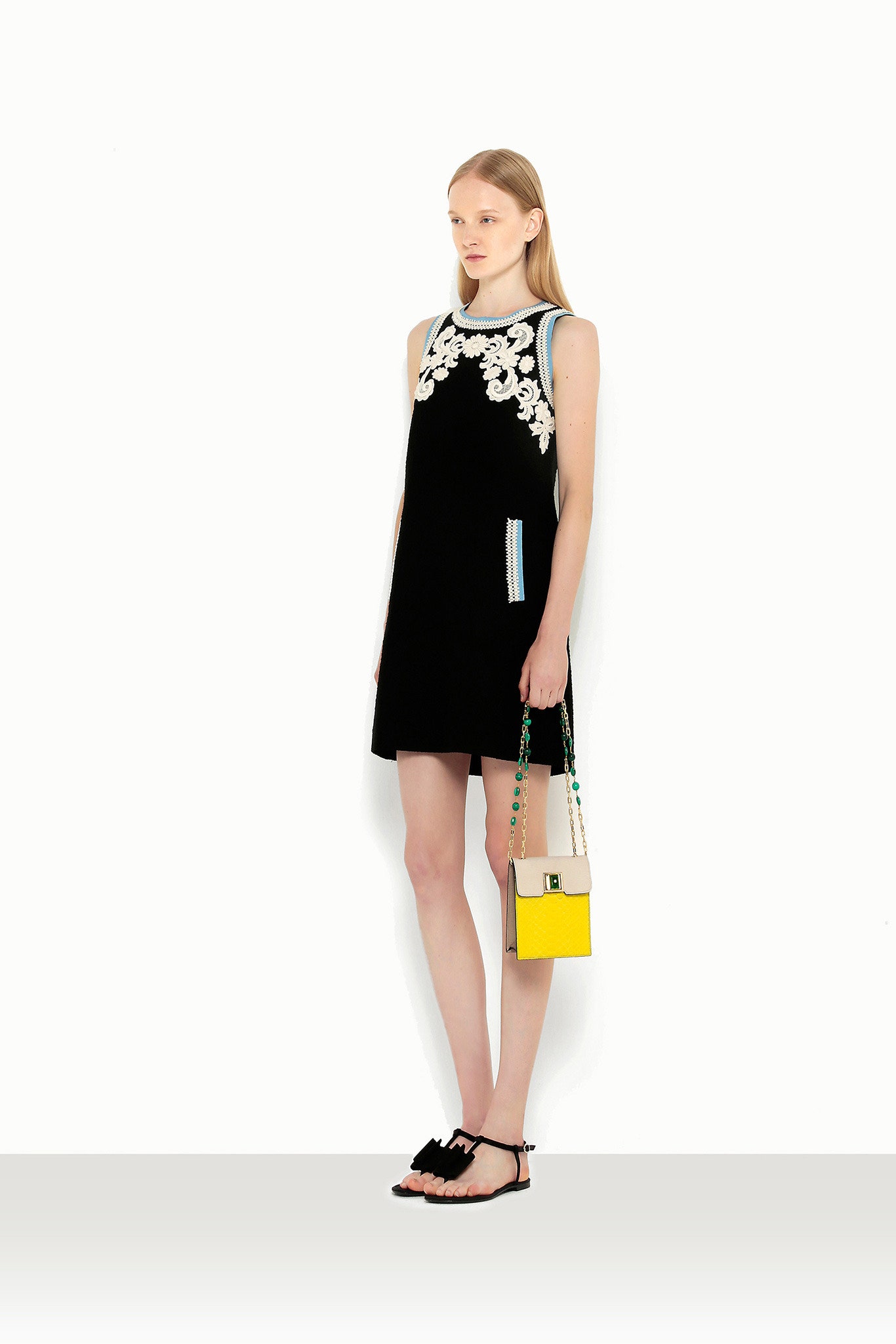 black embroidered sleeveless dress