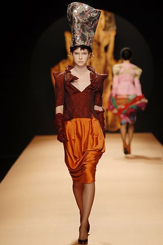 red silk fitted blazer with orange skirt