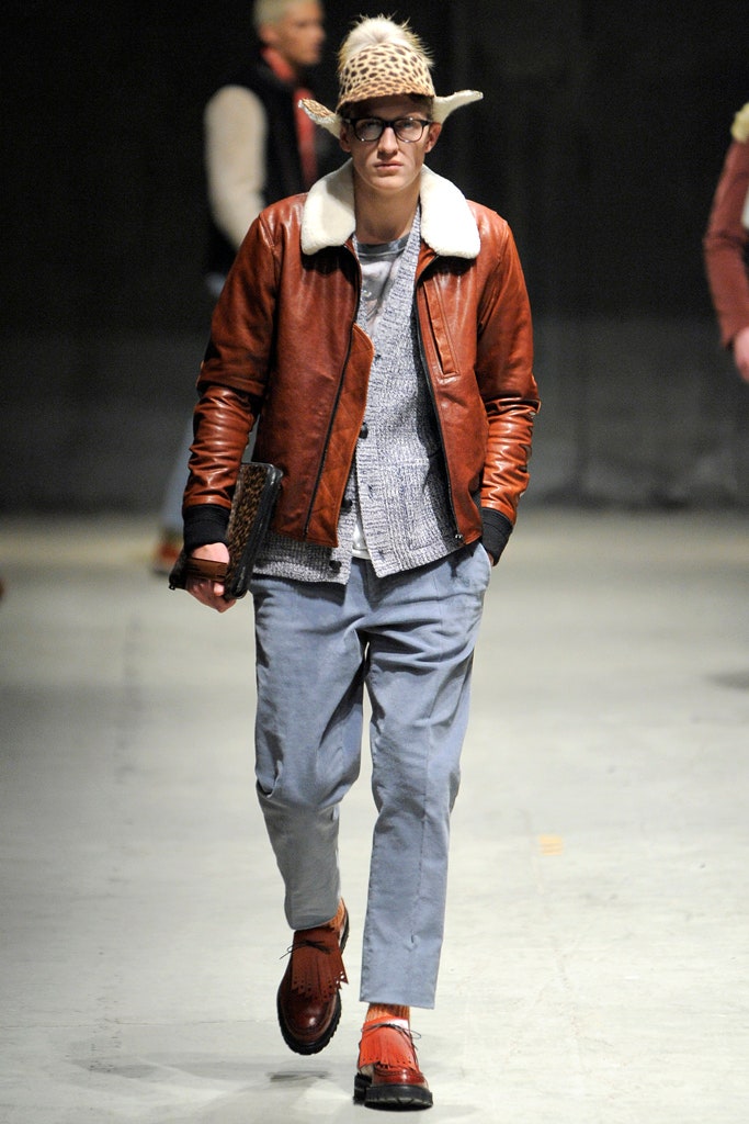 brown leather jacket gray sweater