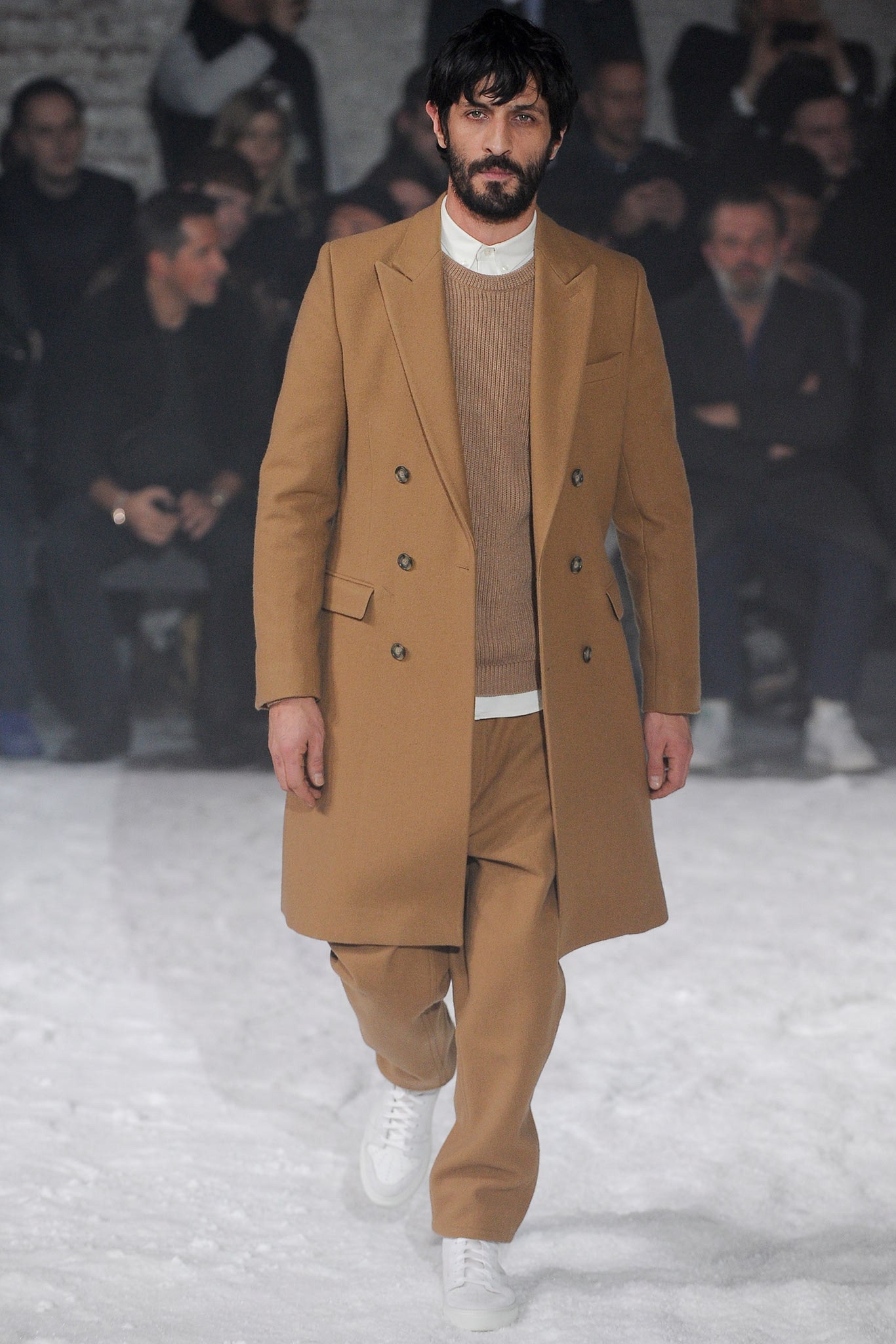 beige tailored coat with sweater