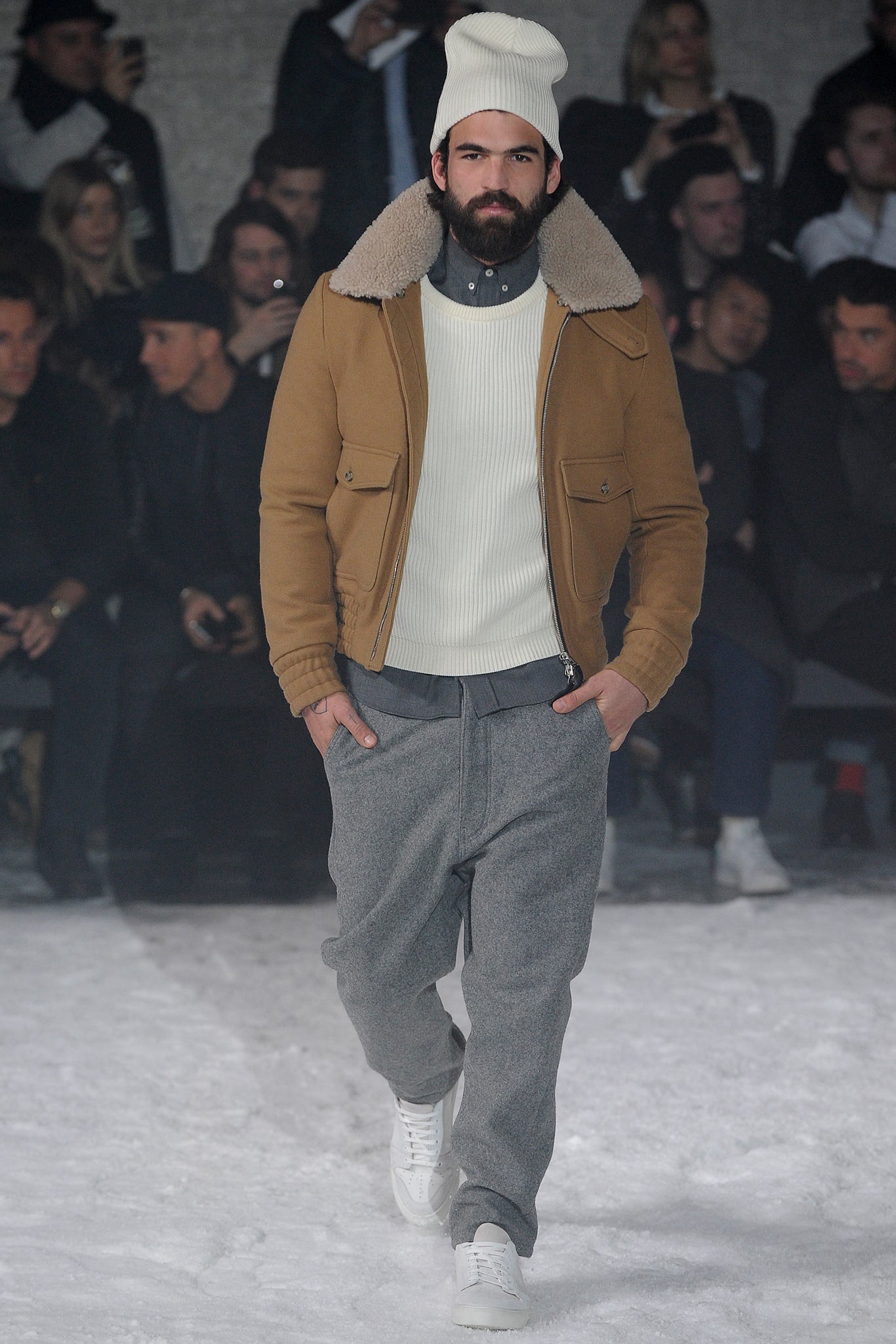 brown leather jacket with white sweater