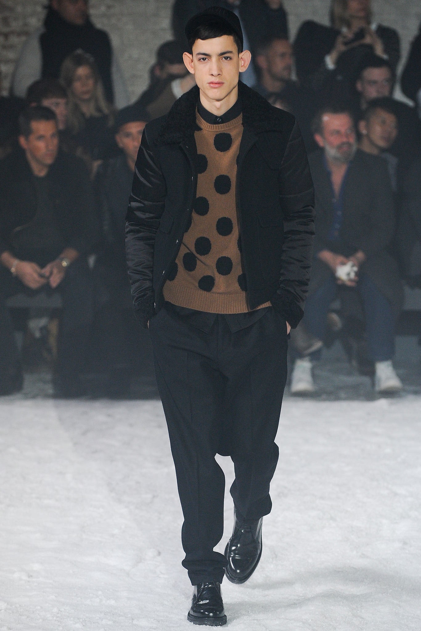 black jacket brown polka-dot sweater