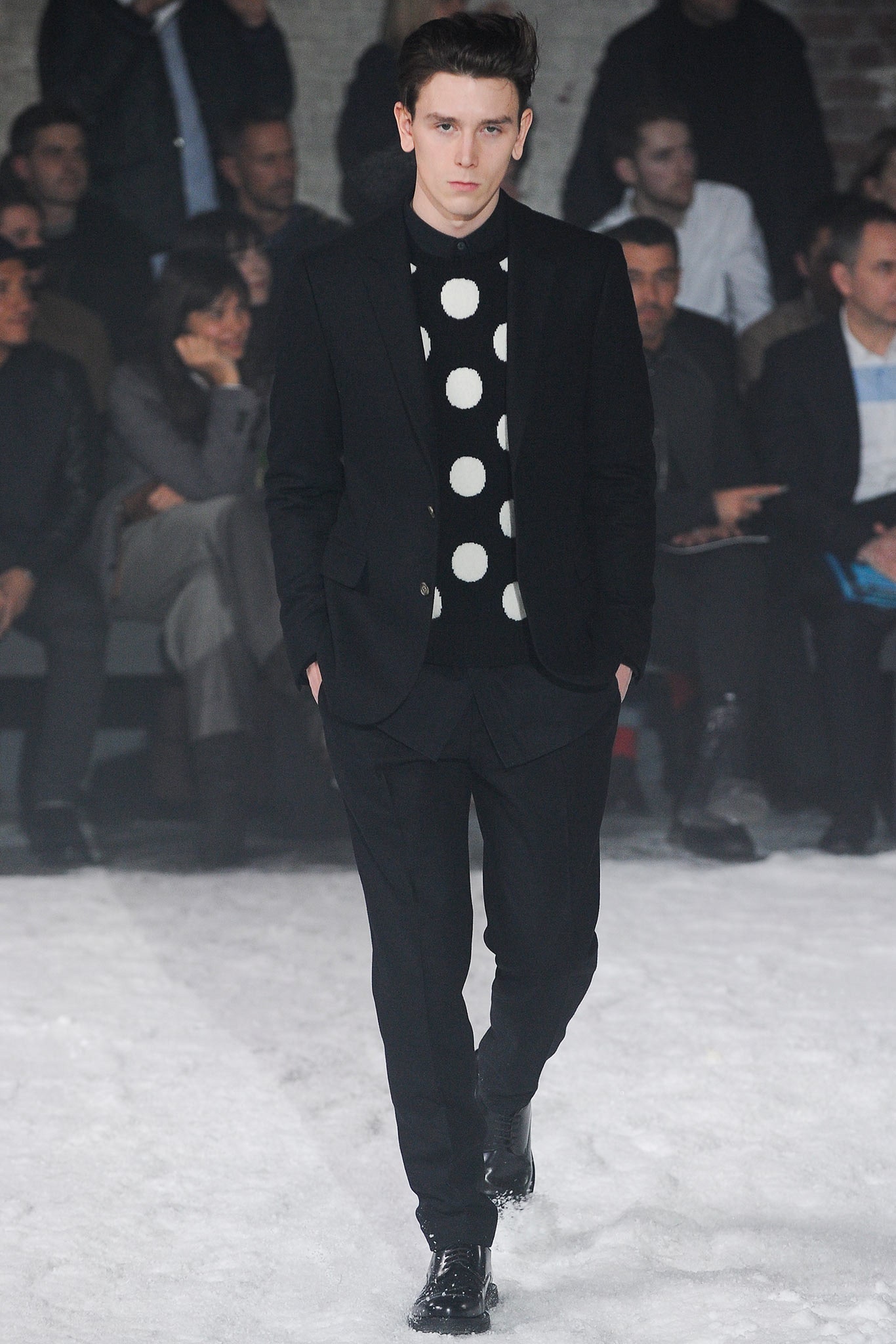 black tailored suit with polka-dot sweater