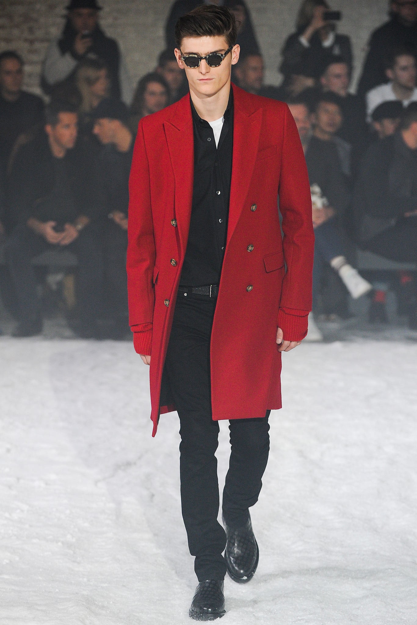 red tailored coat with black shirt
