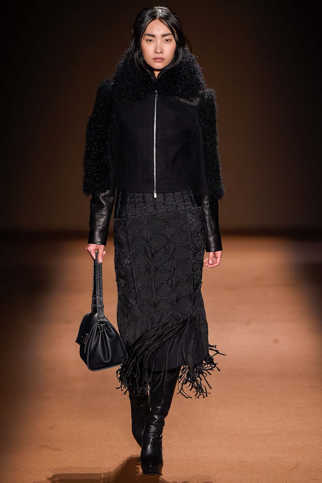 black fitted jacket and midi skirt