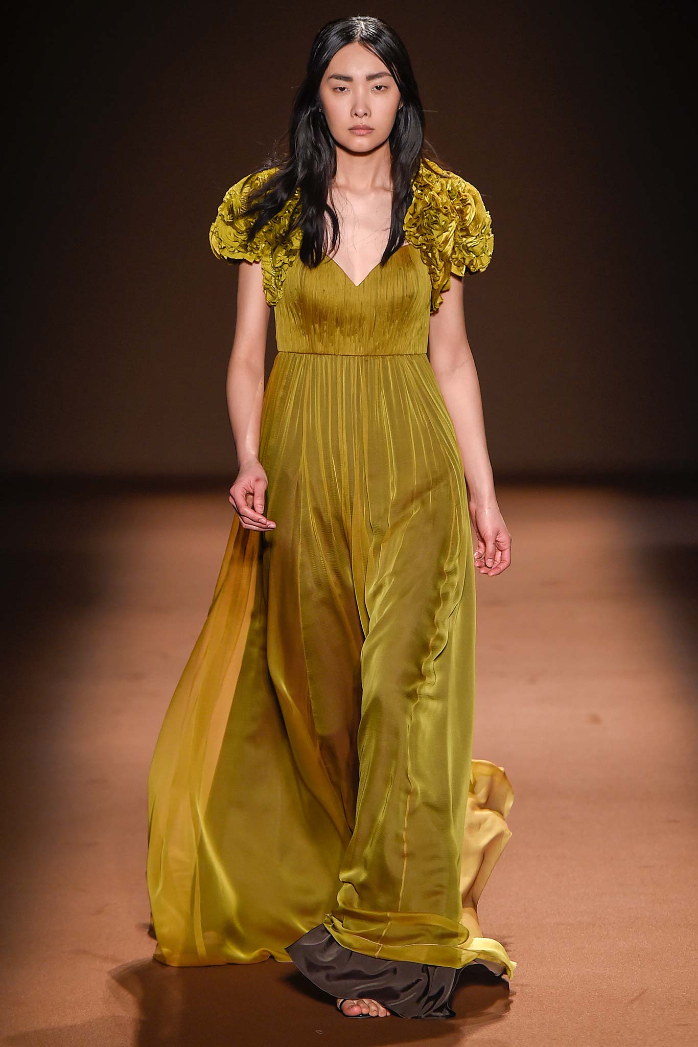 green silk pleated gown