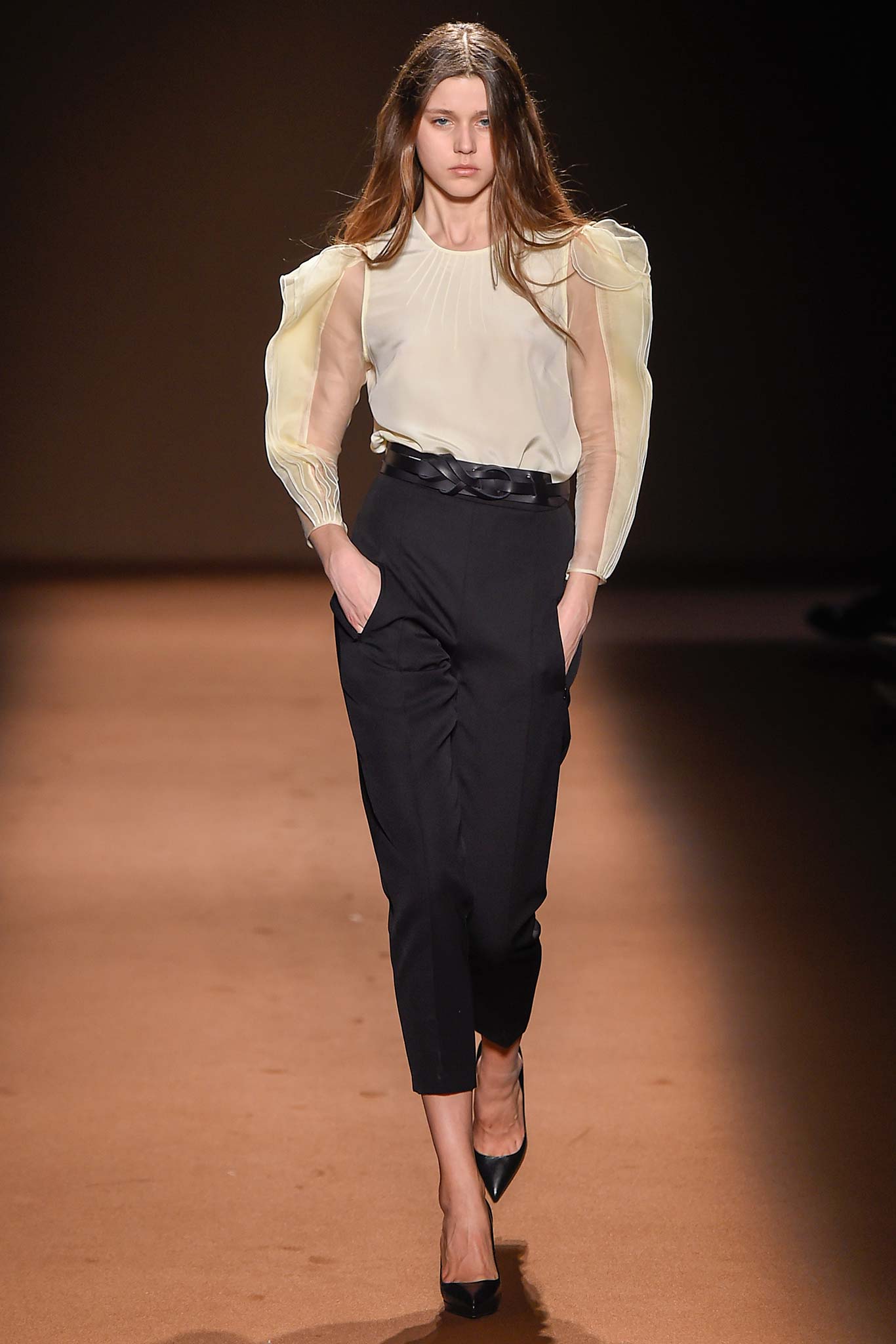 white silk long-sleeve high-neck fitted pleated blouse
