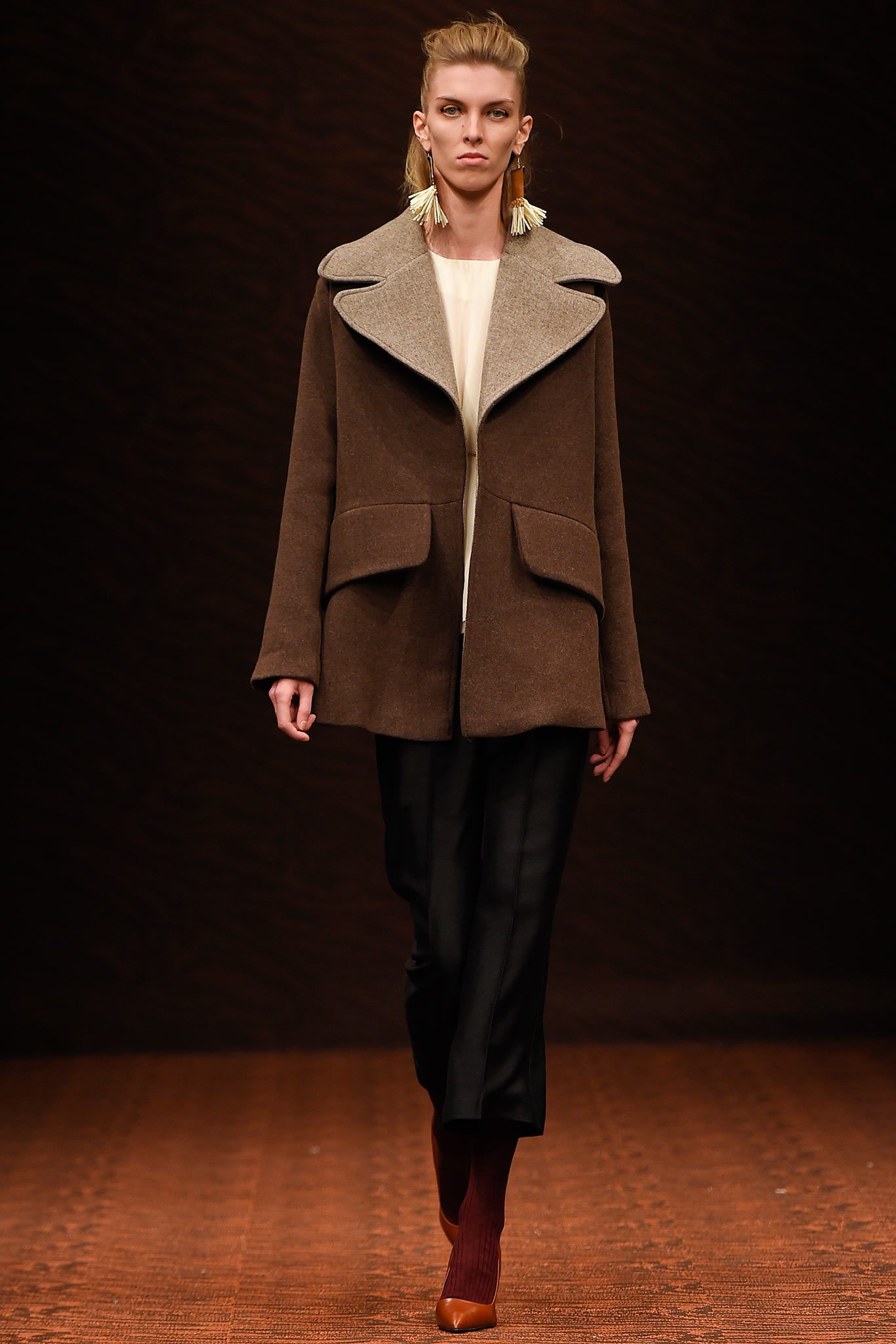 brown wool coat with black pants