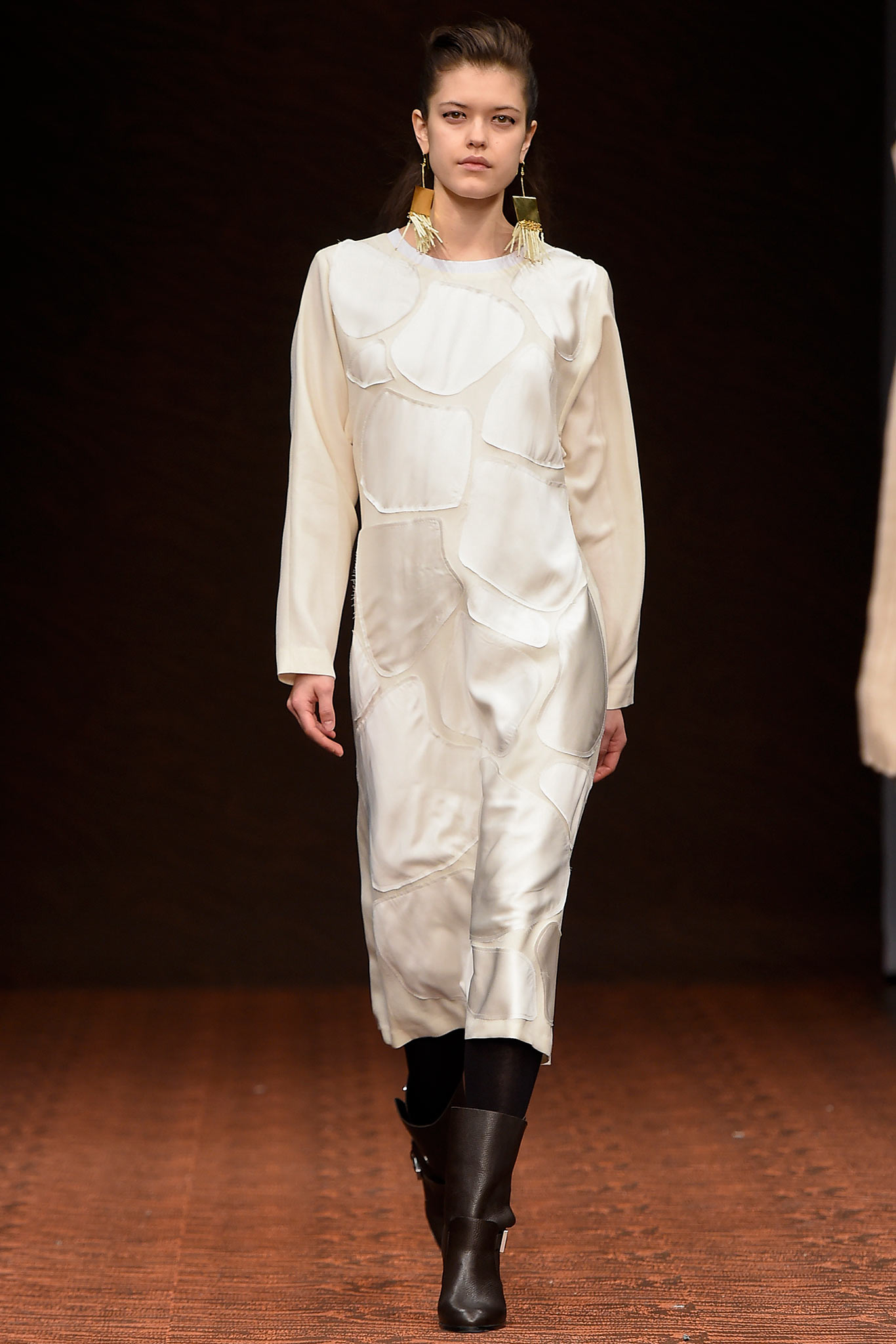 white silk fitted dress with black boots