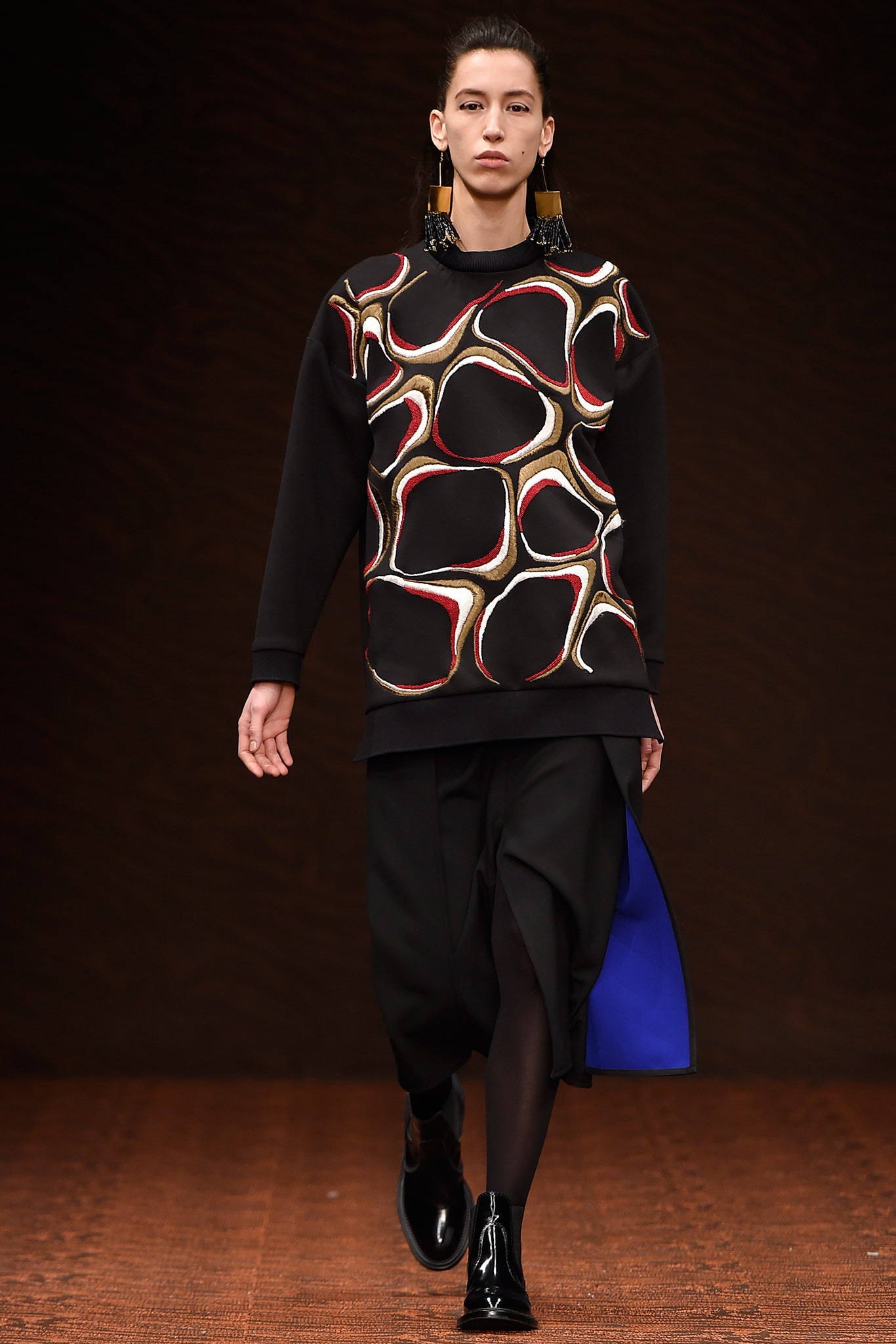 black printed relaxed sweater and skirt