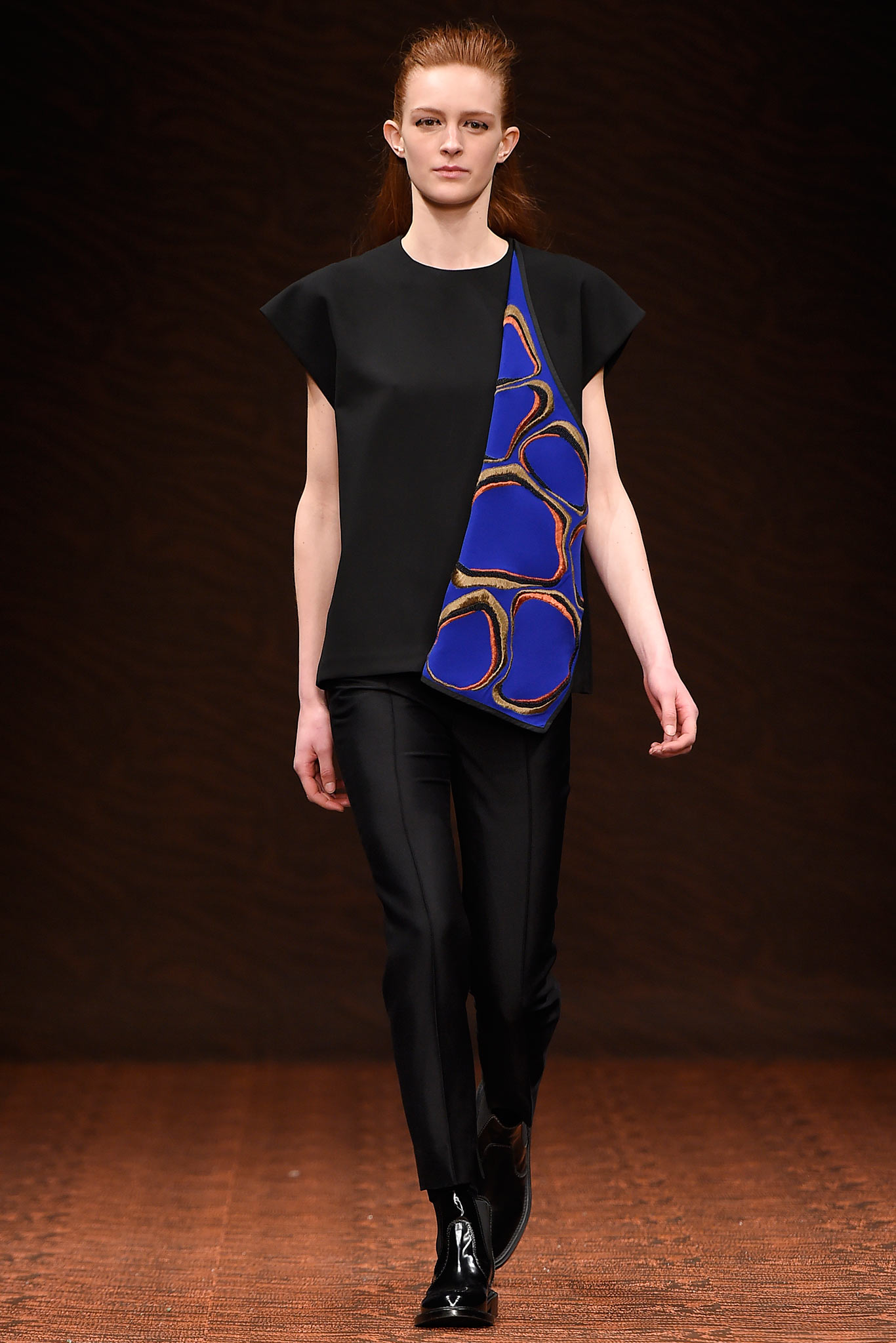 black asymmetric top with blue print