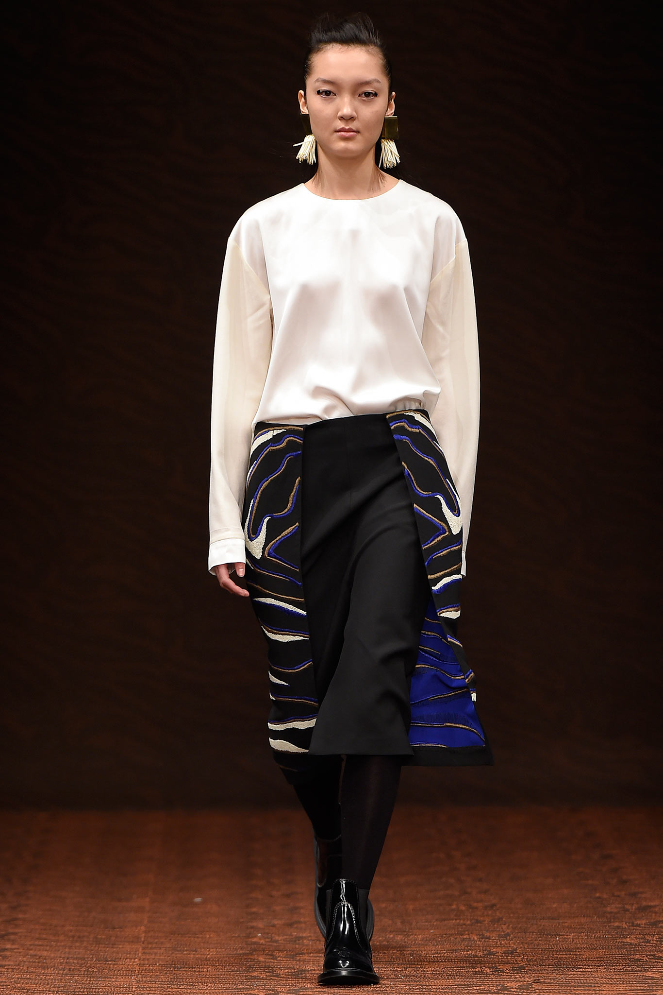 white silk blouse with black skirt