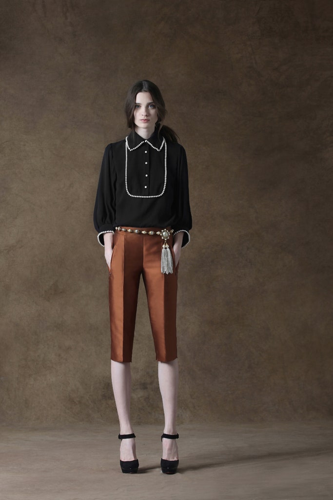 black silk blouse with brown pants