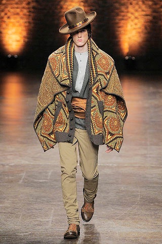 brown printed poncho with gray shirt