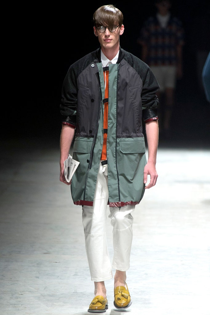 black gray relaxed coat with orange shirt