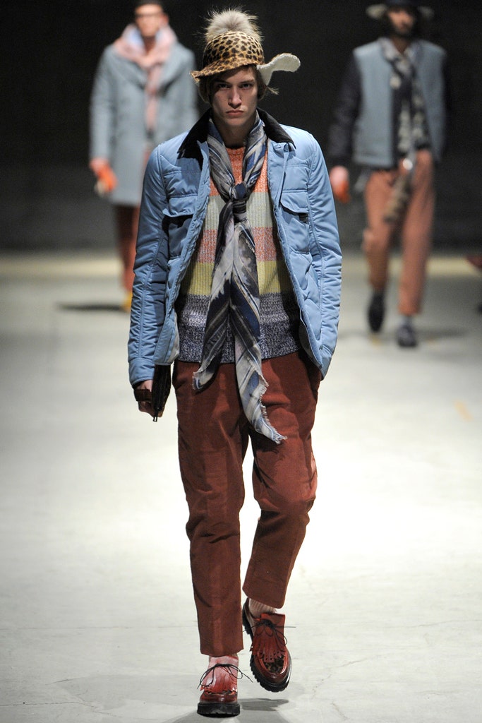 blue jacket with multicolor sweater