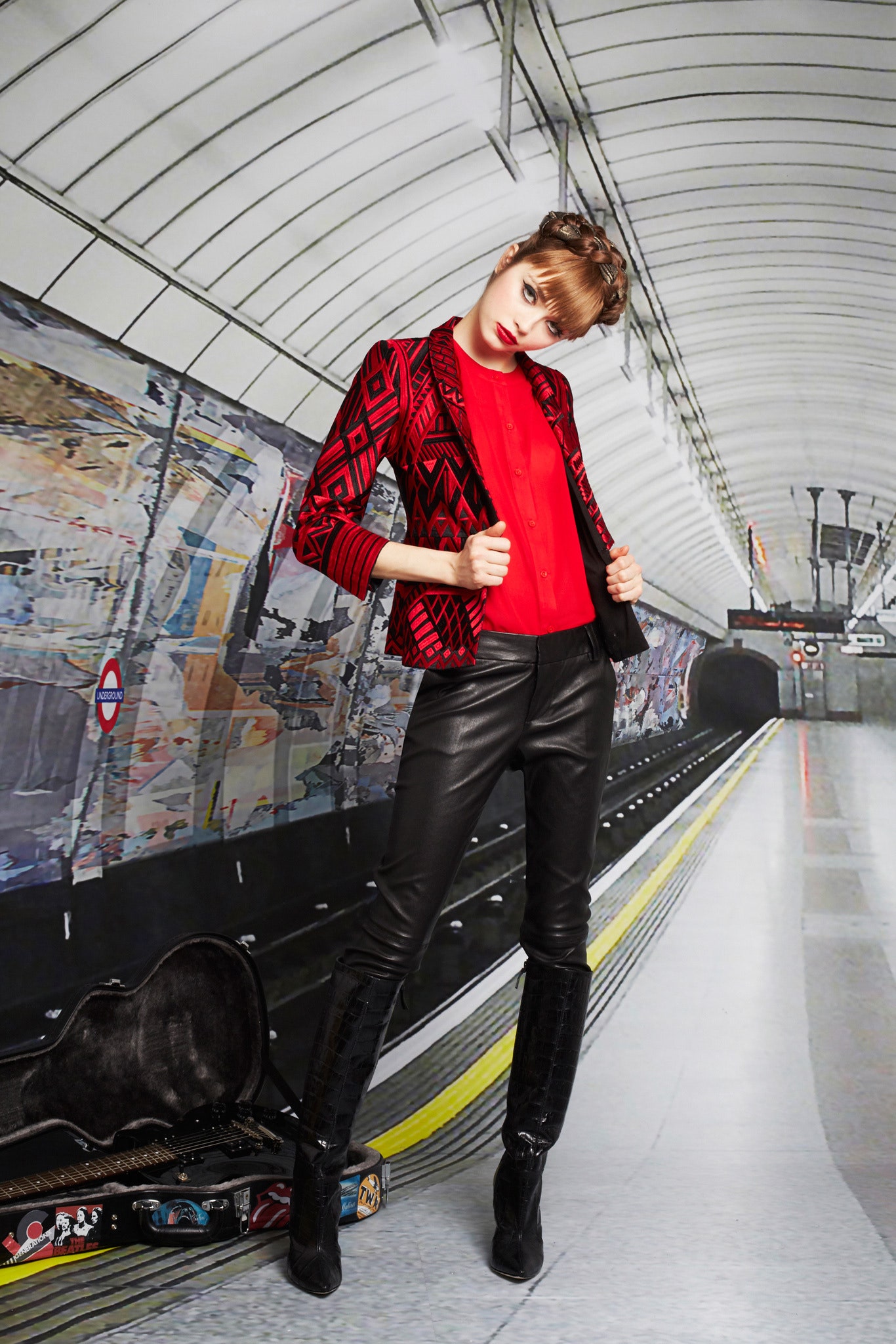 red printed jacket with black pants