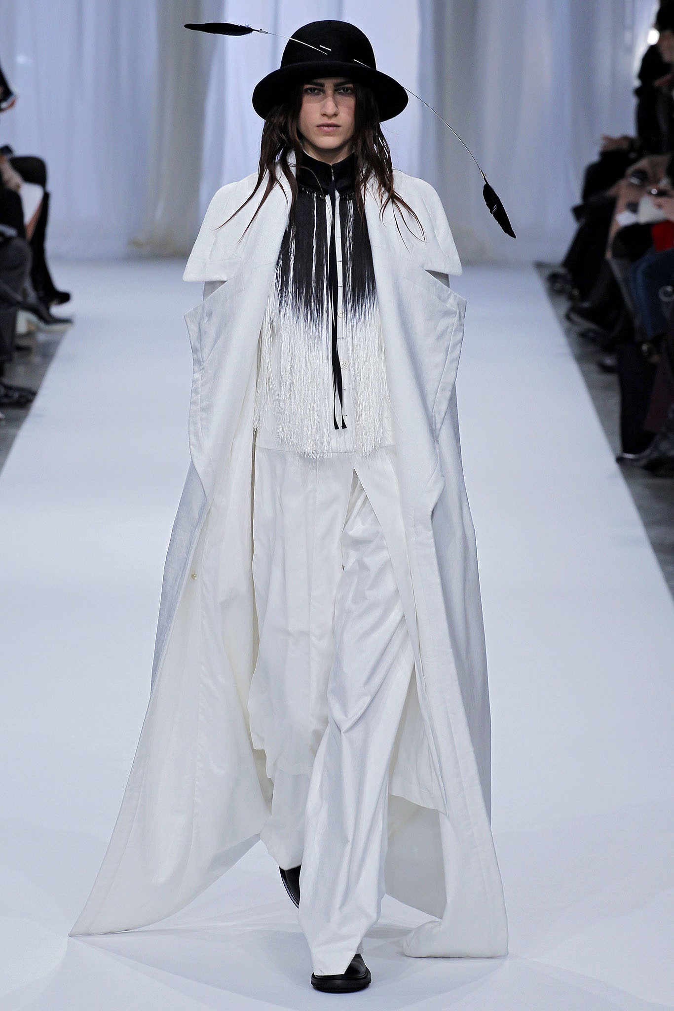 white silk coat with fringed details