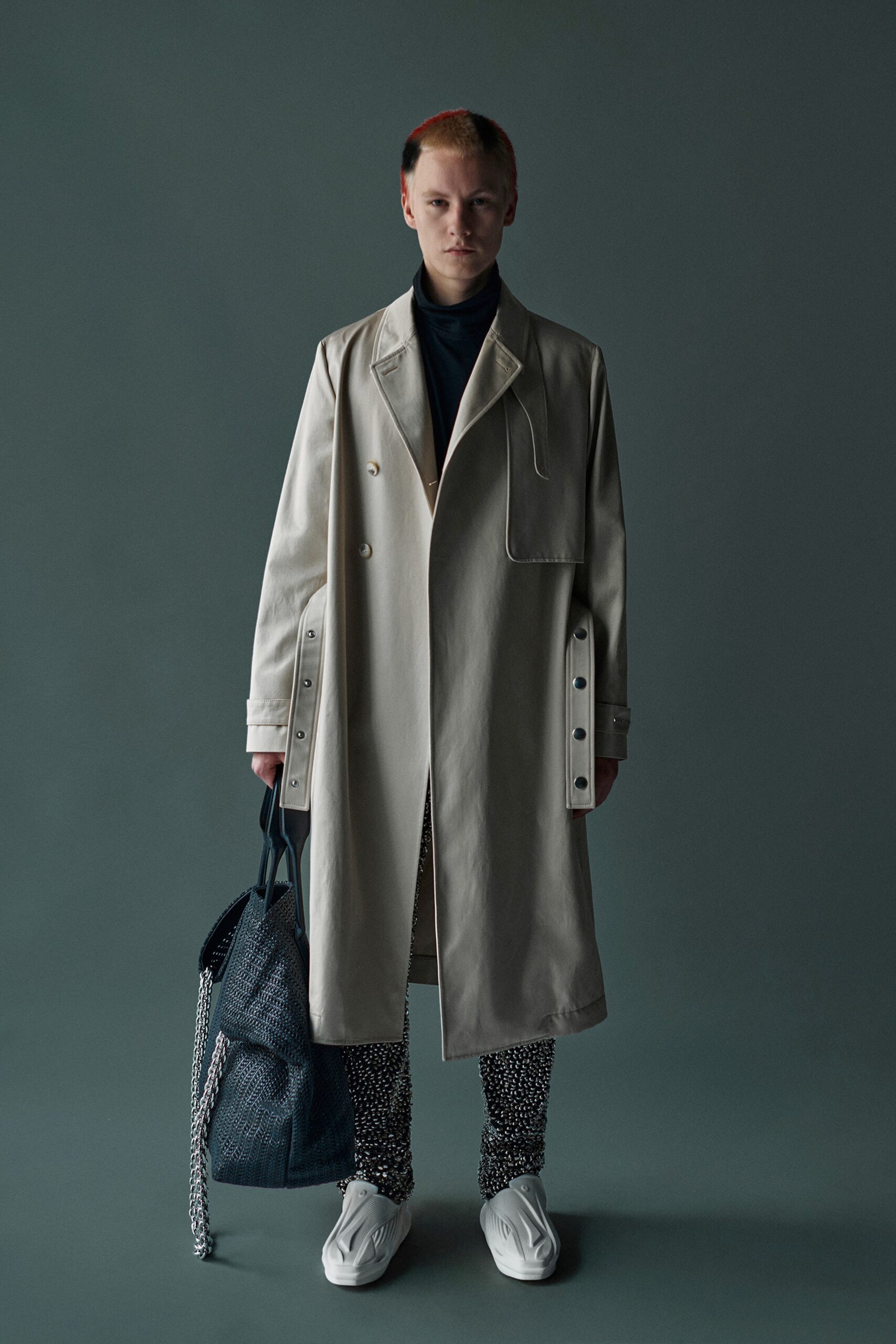 beige trench coat with black top