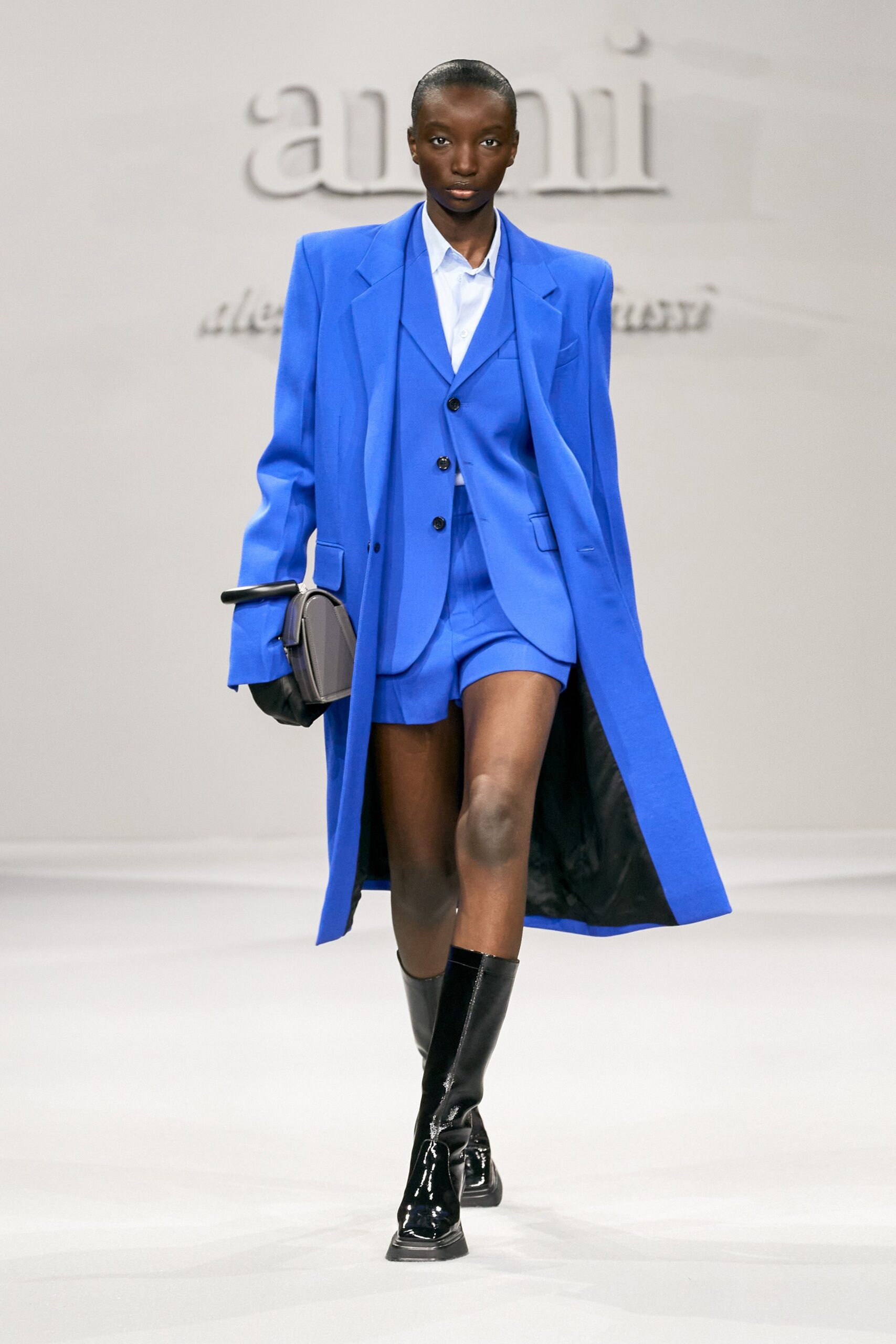 blue tailored suit with shorts