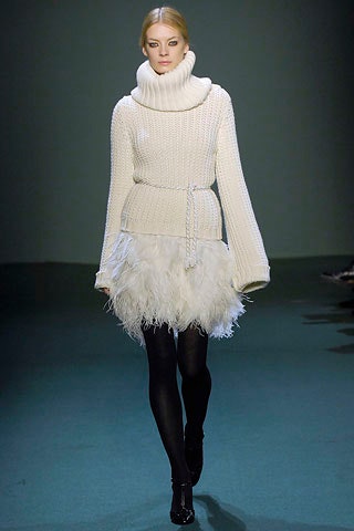 white wool sweater and feather skirt