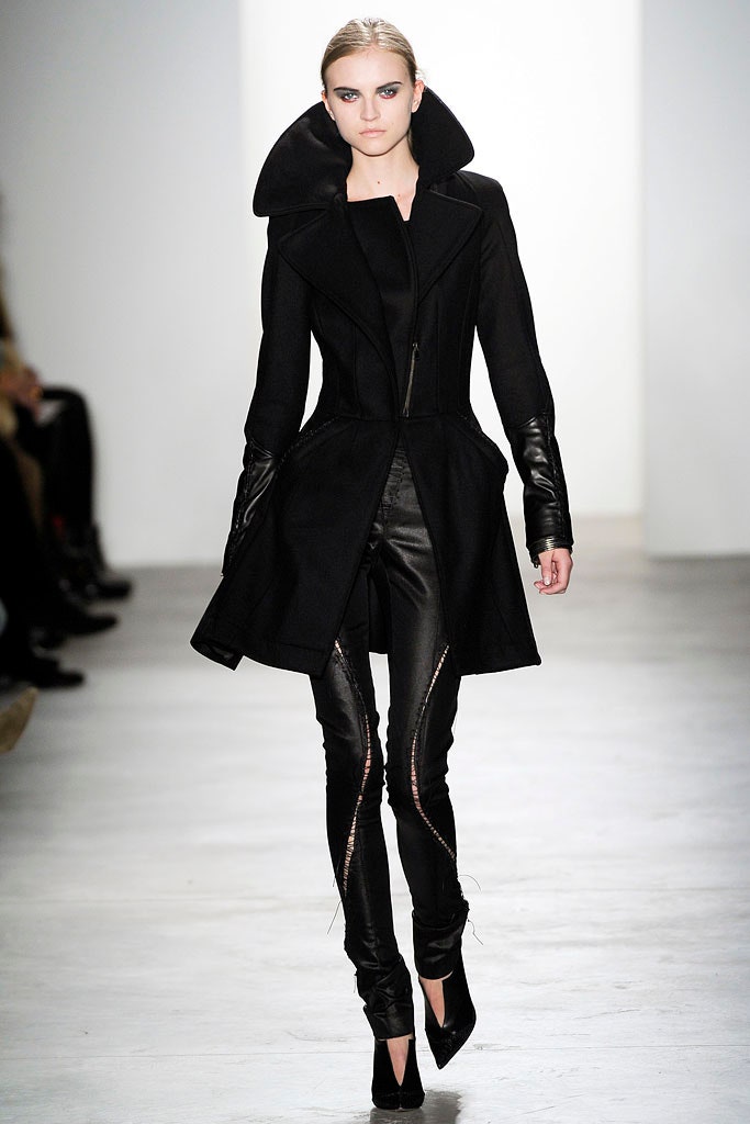 black fitted coat and leather pants