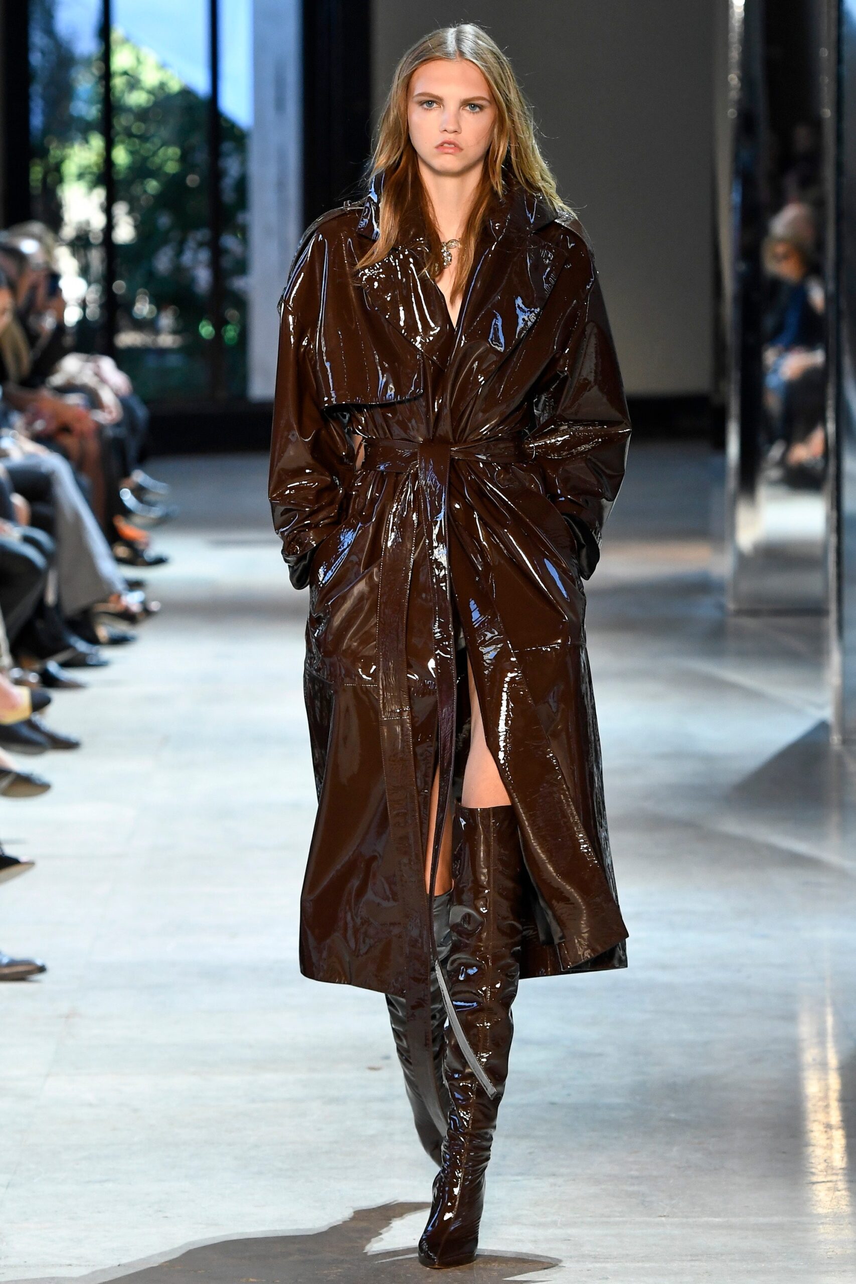 shiny brown vinyl trench coat and boots