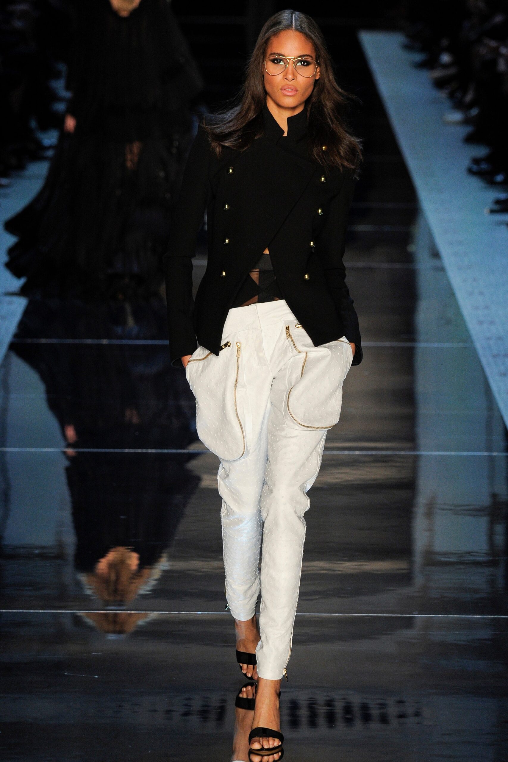 black fitted blazer with white pants