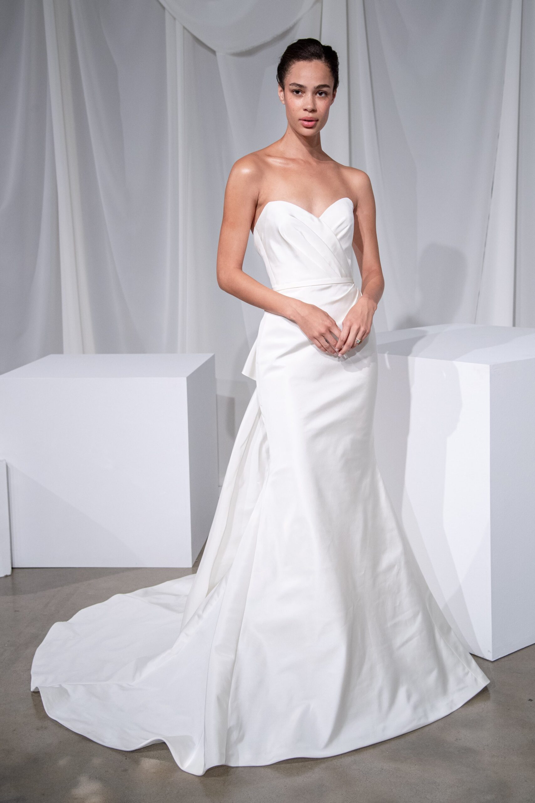 white silk strapless gown