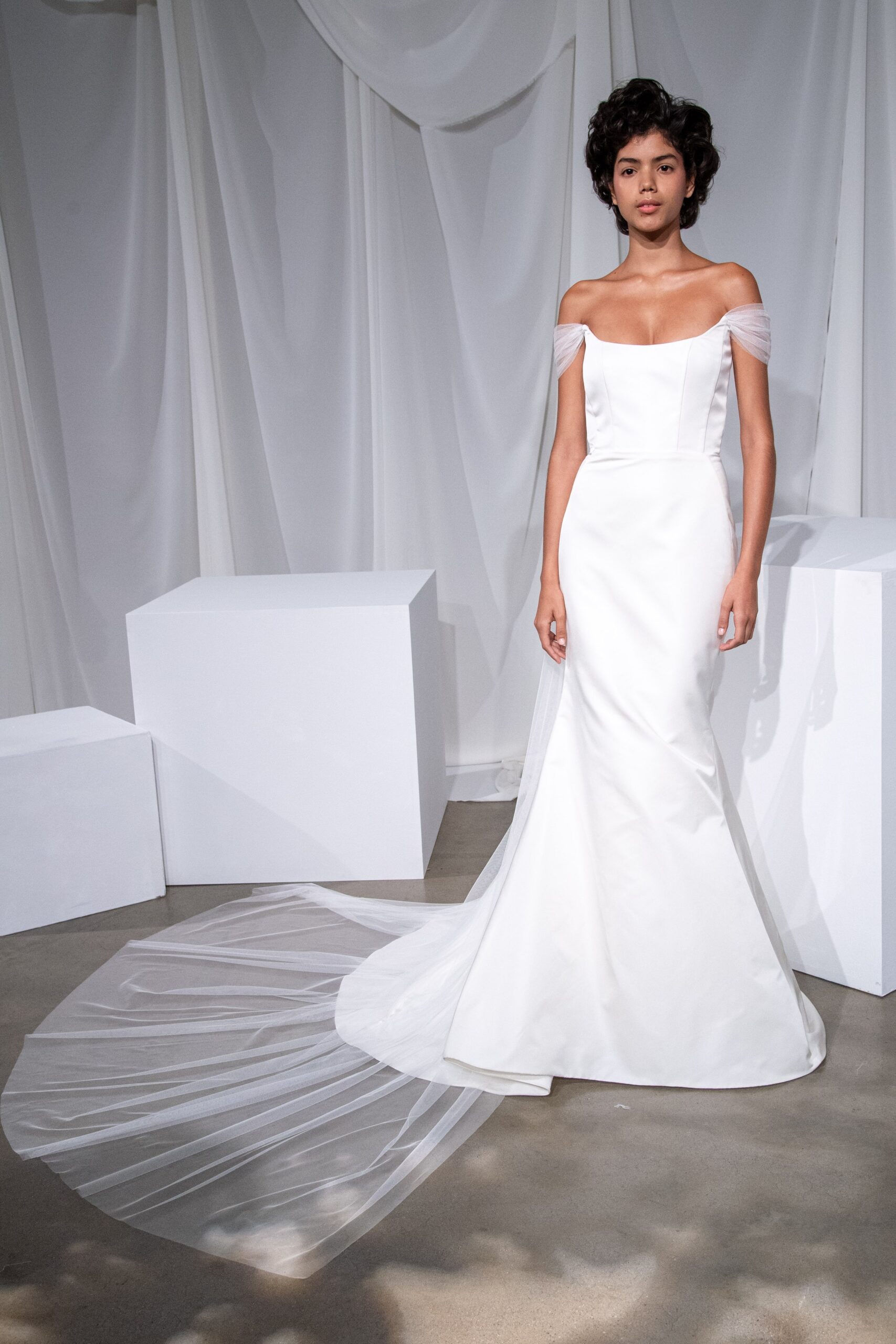 white silk off-shoulder gown