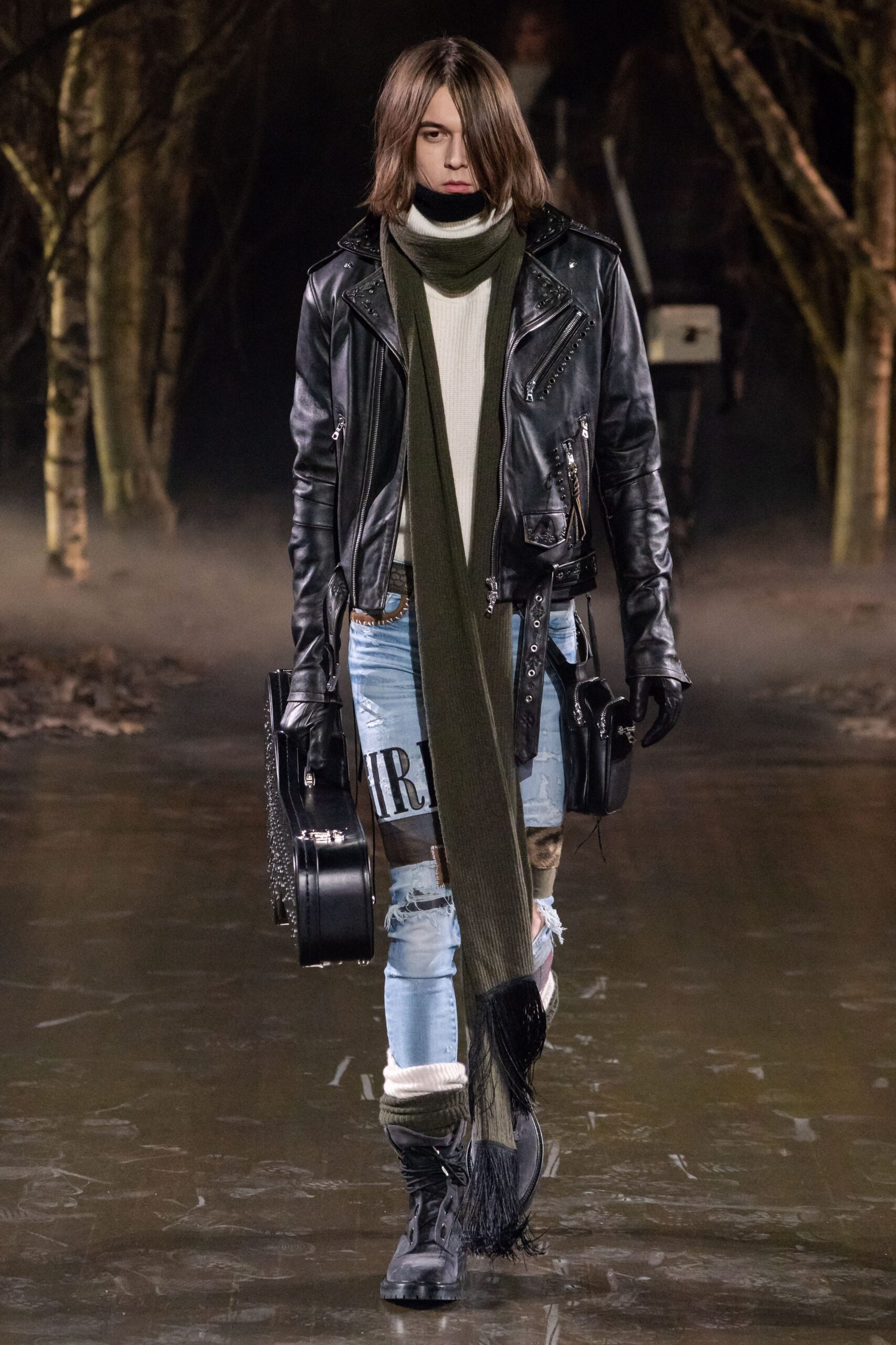 black leather jacket with distressed jeans