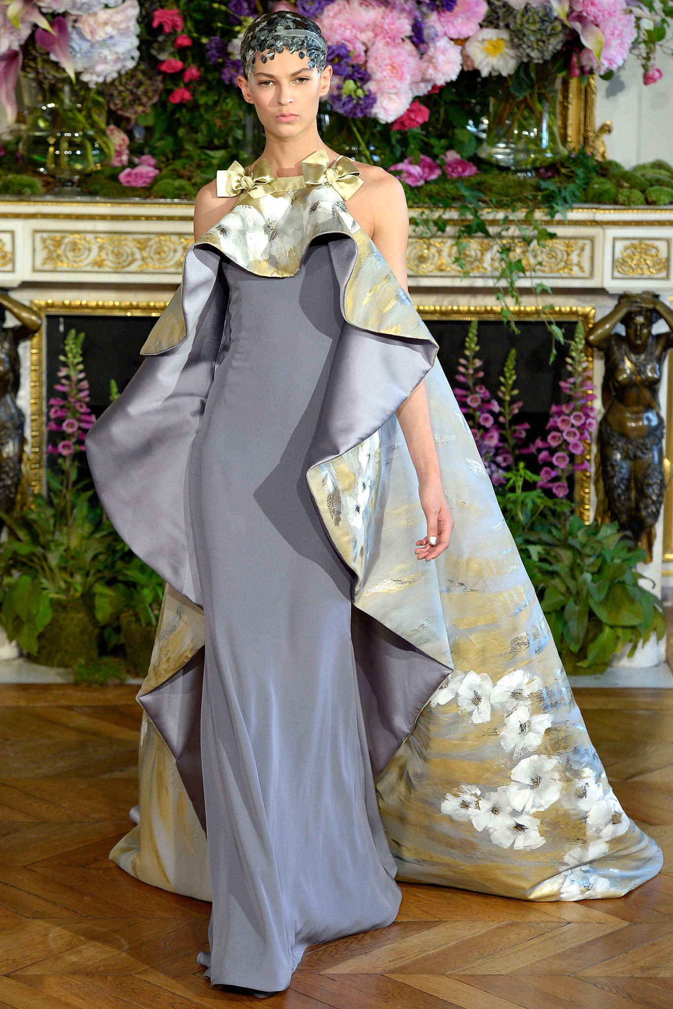 gray and gold draped gown