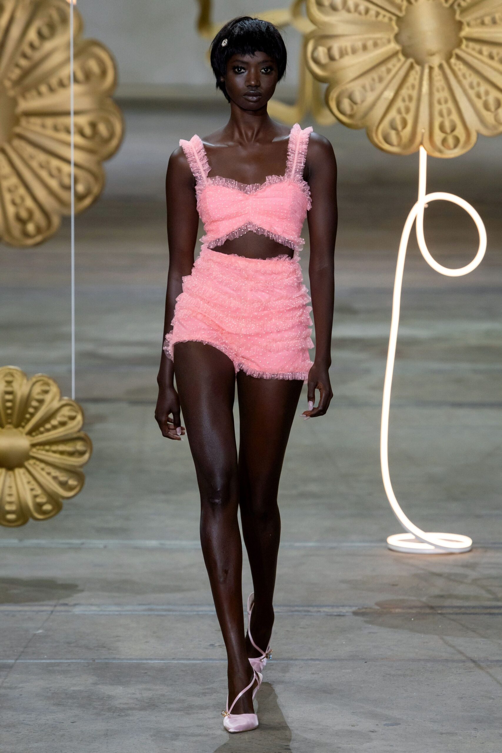 pink ruffled sleeveless romper