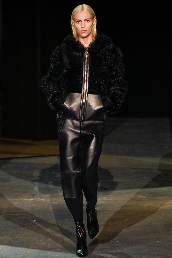 black faux-fur jacket and leather pants