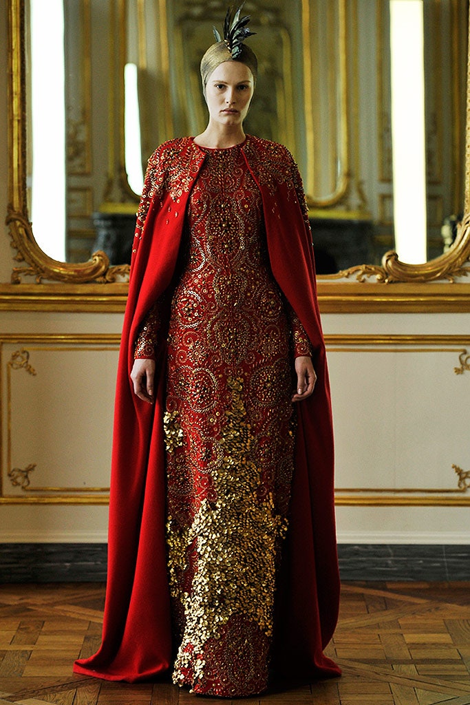 red embellished gown with cape