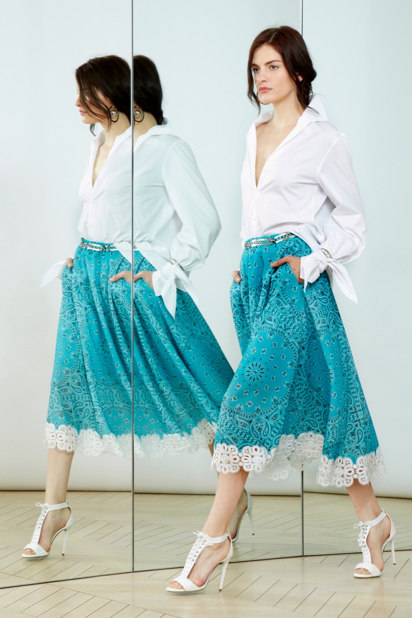 white shirt blue pleated skirt