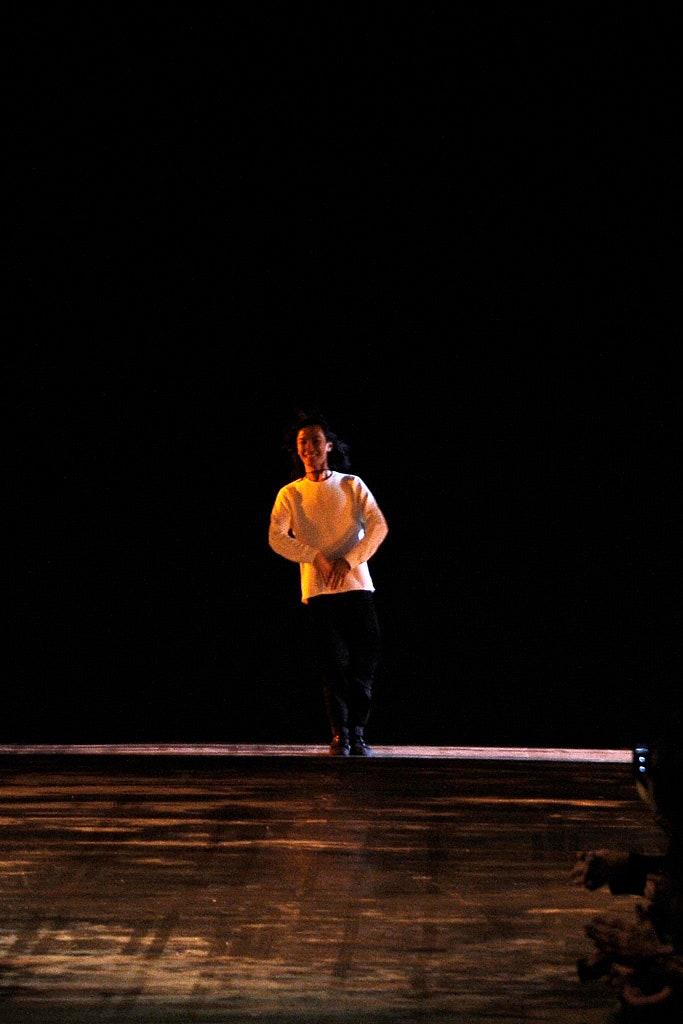 white wool relaxed sweater and black fitted pants