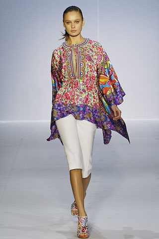 multi-colored relaxed top with white pants