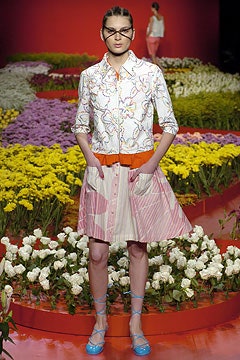 fitted multi-colored jacket and mini skirt