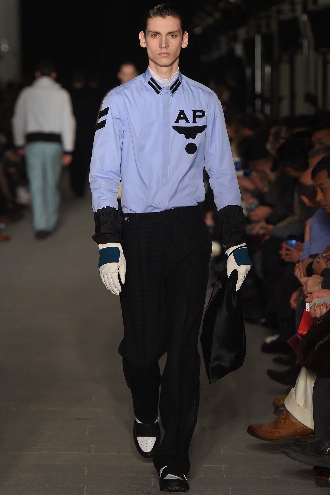 blue fitted shirt with black pants