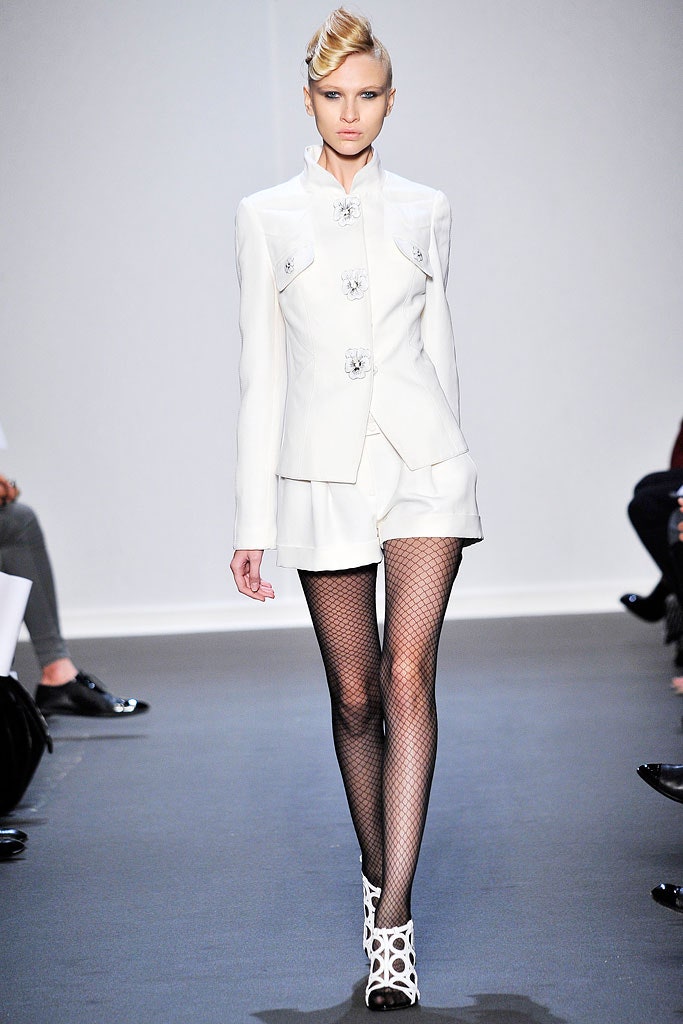 white tailored blazer and shorts