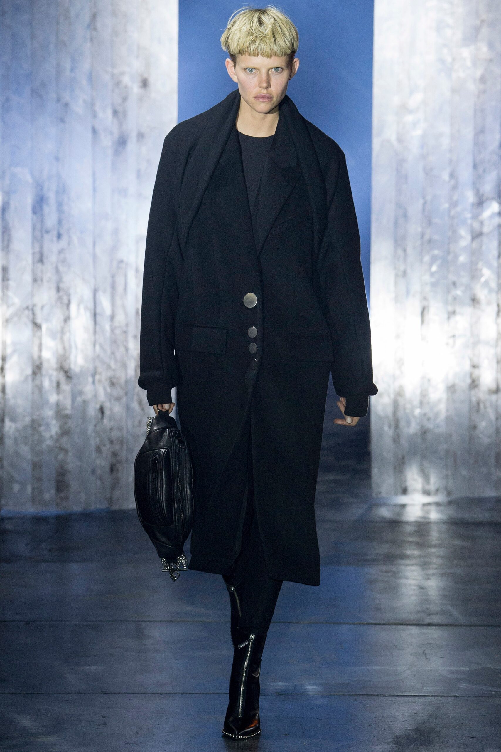 black wool long-sleeve collared oversized buttoned coat