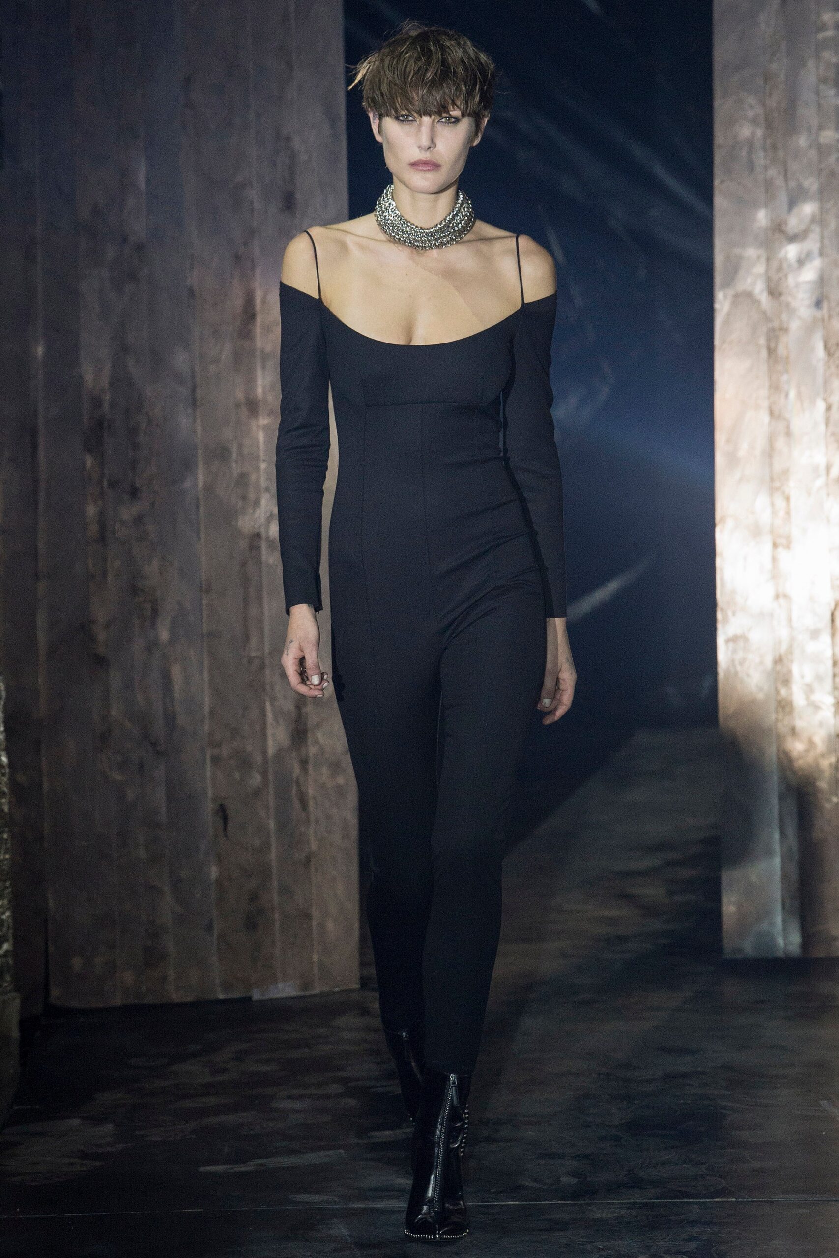 black fitted sleeveless catsuit