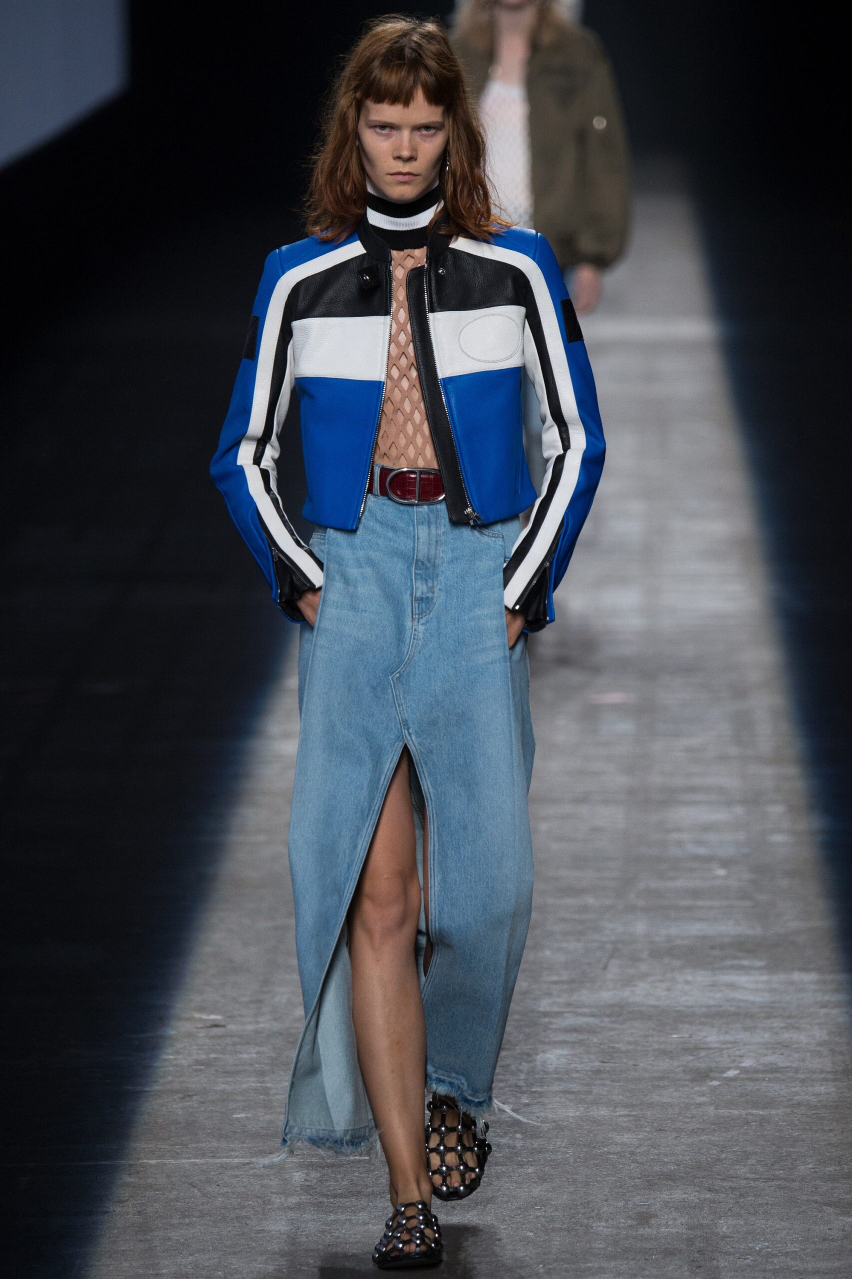 fitted blue leather jacket and denim skirt