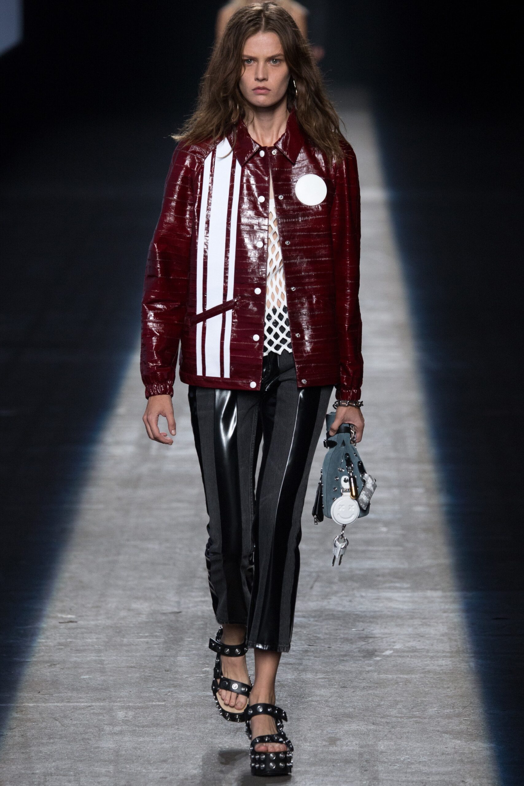 red vinyl jacket with striped pants